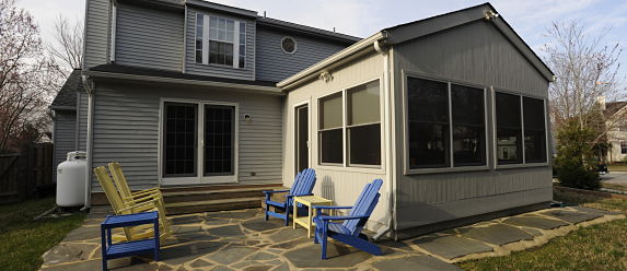 Custom patio addition with flagstone at Columbia Maryland home